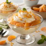 Orange Creamsicle Salad with creamy texture and bright citrus flavor, perfect for summer gatherings.